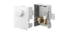A white thermostat control unit and its grey housing with brass fittings are shown against a white background. Produktbild-Vorschau