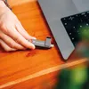 A hand is inserting a Verbatim USB drive into a laptop. Náhľad obrázku produktu