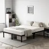 A bedroom scene with a bed frame and mattress. Voir les images du produit
