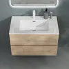 A modern bathroom vanity with a sink and wooden drawers. Produktbild-Vorschau