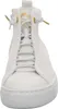 A front view of a white high-top sneaker with gold accents. Voir les images du produit