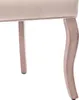 A close-up view of the legs and bottom edge of a beige upholstered chair. Anteprima dell’immagine prodotto