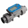 A digital flow meter with a digital display and buttons. Anteprima dell’immagine prodotto