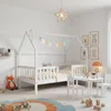 A child's bedroom with a white house-shaped bed, a small table and chairs, and decorative items. Náhled obrázku produktu