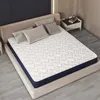 A mattress is placed on a bed frame, with pillows on top. Produktbild-Vorschau