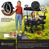 A family is enjoying an outdoor outing with a KESSER® Bollerwagen. Produktbild-Vorschau