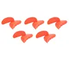 A group of orange shoe inserts arranged in two rows. Produktbild-Vorschau