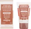 A product shot of a box and a tube of Sisley tinted sun care. Podgląd zdjęcia produktu