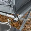 A close-up view of the corner of a camping bed frame with a tent attached. Produktbild-Vorschau