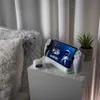 A gaming accessory setup on a nightstand. Anteprima dell’immagine prodotto