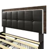 A close-up view of a bed frame's headboard and part of the base. Náhled obrázku produktu