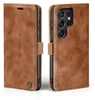 A brown leather flip case for a Samsung Galaxy S22 Ultra phone, shown from the front and back. Produktbild-Vorschau