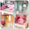 A collage of four close-up images showing different rooms and furniture of a wooden dollhouse. Voir les images du produit