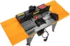 A router table with orange extension wings and a black router assembly. Anteprima dell’immagine prodotto