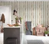 A kitchen island and wall decorated with a wood-plank wallpaper. Produktbild-Vorschau