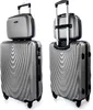 Two views of a silver luggage set, a large suitcase with a smaller cosmetic case on top. Náhled obrázku produktu