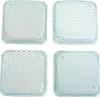Four square, transparent blue plastic containers with perforated tops, stacked in two pairs. Náhled obrázku produktu