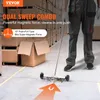 A person is using a magnetic sweeper in a warehouse setting. Podgląd zdjęcia produktu
