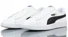A pair of white Puma Smash V2 L sneakers with black Puma branding on a white background. Podgląd zdjęcia produktu