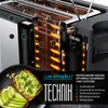 A cutaway view of a toaster showing its internal components and heating elements, with toast and avocado in the foreground. Produktbild-Vorschau