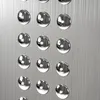 A close-up view of a brushed metal surface with multiple circular, reflective metallic fixtures arranged in a grid pattern. Podgląd zdjęcia produktu