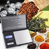 A digital scale surrounded by various items including diamonds, coffee beans, tea leaves, and spices. Produktbild-Vorschau