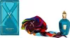 A perfume box, a colorful scarf, and a perfume bottle are displayed against a white background. Voir les images du produit