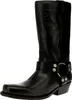 A black leather boot with a square toe and a buckle strap. Voir les images du produit