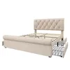A beige upholstered bed frame with a tufted headboard and footboard, shown with two storage drawers pulled out from underneath. Anteprima dell’immagine prodotto