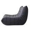 A gray beanbag chair or lounge chair with a tufted seat and a curved backrest, isolated on a white background. Produktbild-Vorschau