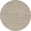 A round rug with a textured geometric pattern. Voir les images du produit