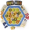 A board game setup with hexagonal tiles representing land and sea, along with game pieces and cards. Náhľad obrázku produktu