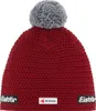 A red knitted beanie with a gray pom-pom on top, shown against a white background. It has two small black and white labels on the bottom edge.