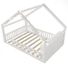 A white wooden house-shaped bed frame with string lights draped over it, shown from a diagonal angle against a white background. Produktbild-Vorschau