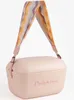 A pink Polarbox cooler bag with a colorful wavy strap is shown against a white background. Produktbild-Vorschau