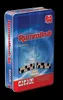 A tin box for the Rummikub Compact board game, shown from a slightly angled front view against a black background. Náhľad obrázku produktu