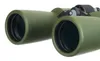 A close-up view of the objective lenses of a pair of green binoculars. Podgląd zdjęcia produktu