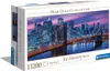 A box of Clementoni puzzles featuring a New York City skyline at dusk. Podgląd zdjęcia produktu
