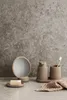 Bathroom accessories arranged on a textured surface. Anteprima dell’immagine prodotto