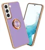 A purple phone case with a gold ring holder is shown diagonally against a white background, with a phone screen visible behind it. Produktbild-Vorschau