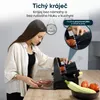 A woman is using a slicer in a kitchen. There's an inset image showing how to use the slicer safely. Náhled obrázku produktu