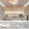 A modern kitchen with a ceiling light fixture, and close-up shots of the light's materials and adjustable feature. Produktbild-Vorschau