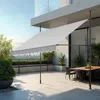 An outdoor patio with a dining set and a retractable awning. Náhled obrázku produktu