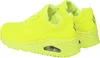 A pair of bright yellow Skechers sports shoes shown from a side-angle. Náhľad obrázku produktu