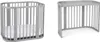 Two views of a gray crib with a white mattress. Produktbild-Vorschau
