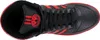 A top-down view of a black and red Adidas sneaker. Podgląd zdjęcia produktu