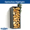 A black metal firewood rack filled with logs, mounted on a white wall with a plant on top. Produktbild-Vorschau