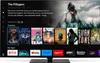 A smart TV screen displaying a streaming service interface with movie posters and app icons. Produktbild-Vorschau