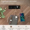A close-up view of a built-in charging station with a phone and earbuds plugged in, set on a wooden surface. Anteprima dell’immagine prodotto