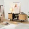 A living room scene featuring a TV stand with decorative items and artwork. Produktbild-Vorschau